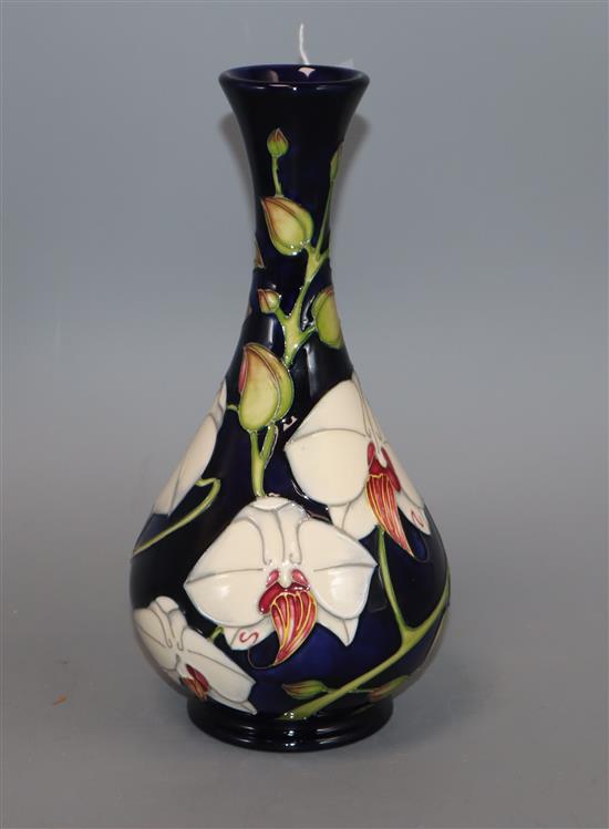 A Moorcroft Chatsworth Orchid bottle vase, seconds height 23cm